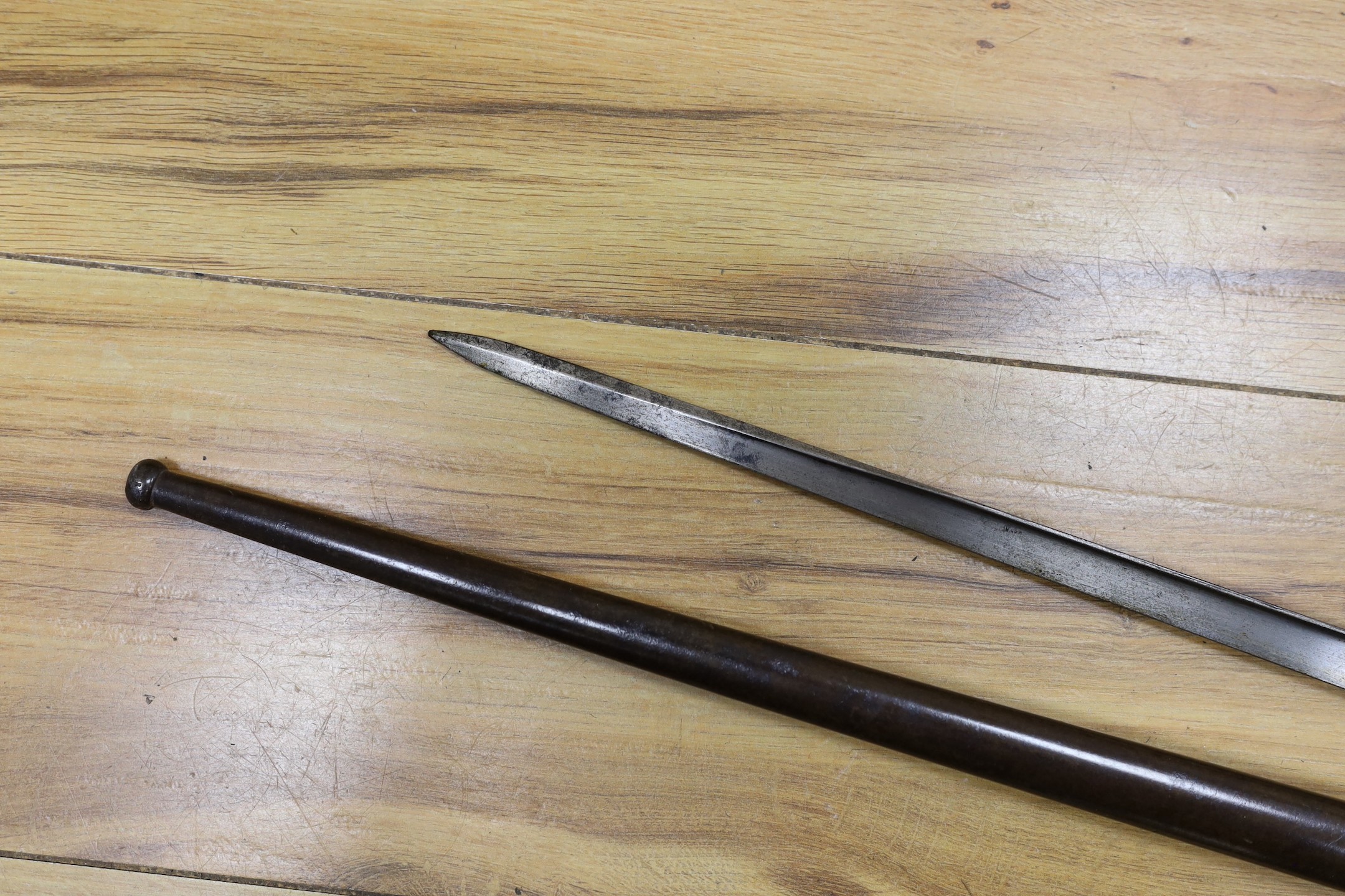 A Victorian officer's sword, lacking sheath, together with a 19th century French ’1877’ bayonet and sheath
